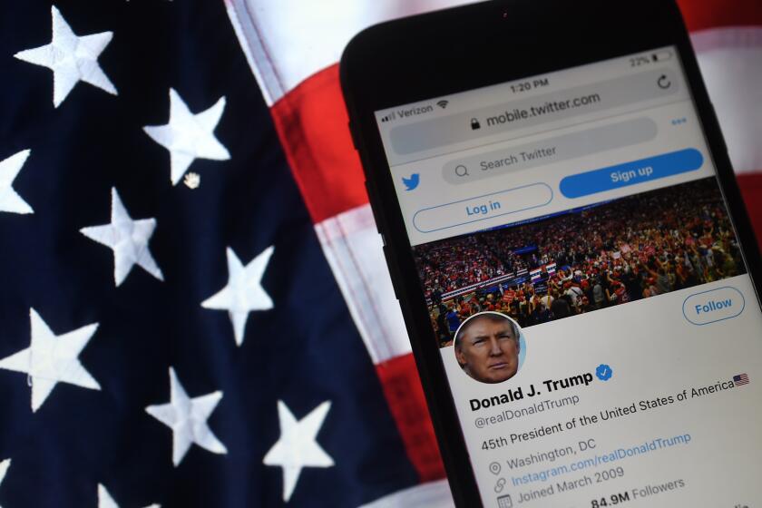 In this photo illustration, the Twitter account of US President Donald Trump is displayed on a mobile phone on August 10, 2020, in Arlington, Virginia. - Wall Street was mixed early Monday, with Nasdaq retreating further as investors digested President Donald Trump's efforts to take unilateral action in the absence of a deal with Congress on emergency pandemic spending. (Photo by Olivier DOULIERY / AFP) (Photo by OLIVIER DOULIERY/AFP via Getty Images)