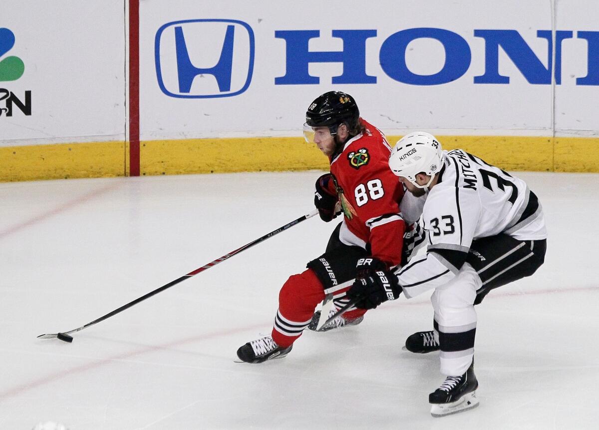 Willie Mitchell and the Kings have done a good job slowing Patrick Kane.