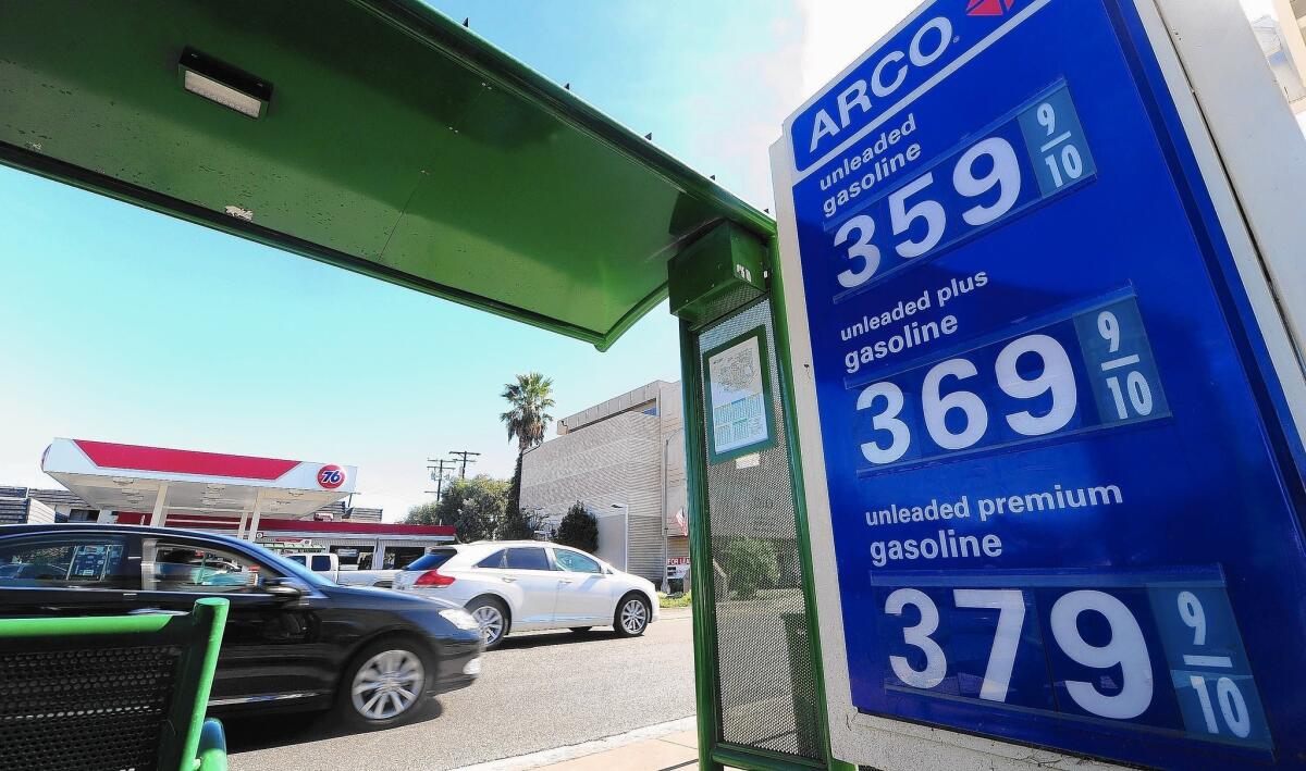 The latest fuel economy figures mean that Americans use 1.7 million fewer gallons of gasoline, or 40,000 barrels of oil, daily. An average 2013 model year vehicle will save drivers about $86 a year over the average 2010 model. Above, a gas station in Alhambra.
