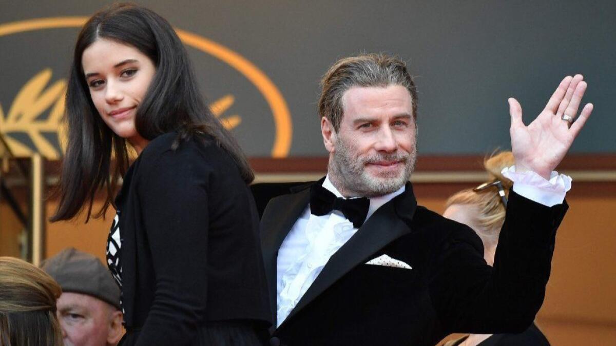 John Travolta and his daughter, Ella Bleu Travolta, arrive May 15 for the screening of "Solo : A Star Wars Story" at the 71st Cannes Film Festival in France.