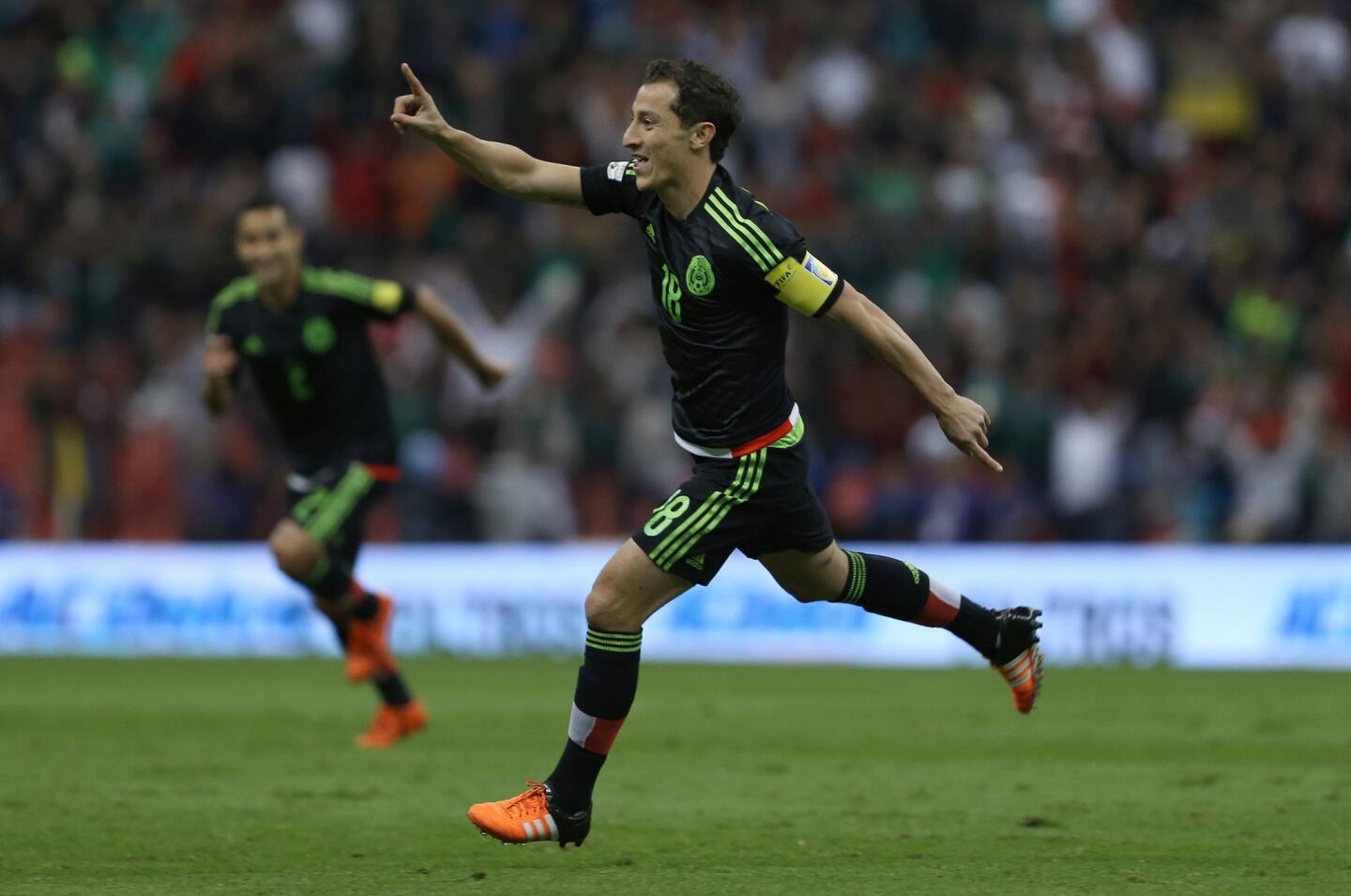 Mexico's Andres Guardado celebrates after scoring against El Salvador during a 2018 World Cup qualifying soccer match in Mexico City, Friday, Nov. 13, 2015.