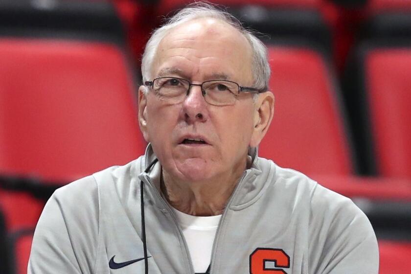 FILE - In this March 15, 2018, file photo, Syracuse head coach Jim Boeheim watches during a practice for an NCAA men's college basketball tournament first-round game, in Detroit. Police say Syracuse men's basketball coach Jim Boeheim struck and killed a 51-year-old man walking outside his vehicle on a highway near Syracuse, N.Y., Wednesday, Feb. 20, 2019. (AP Photo/Carlos Osorio, File)