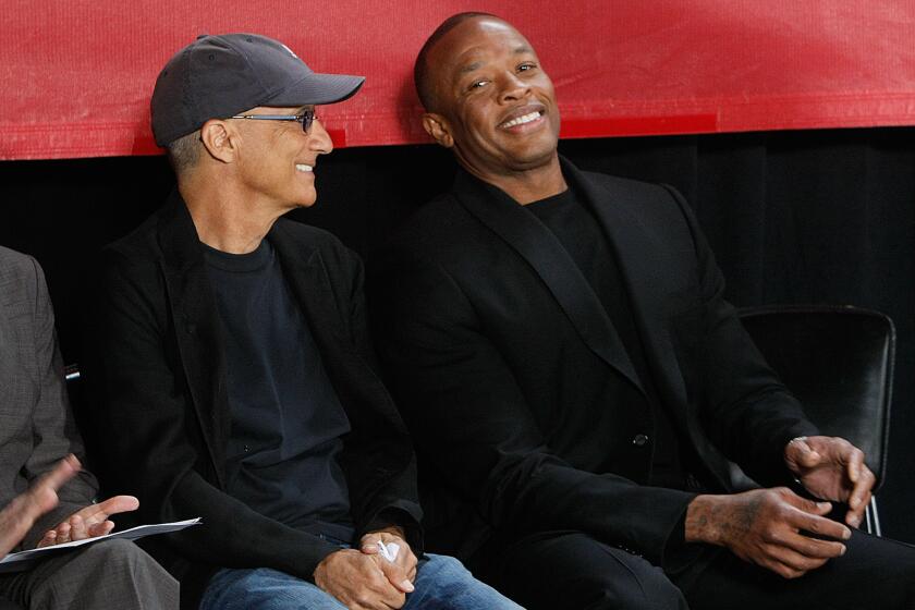 Music mogul Jimmy Iovine, left, and rapper Dr. Dre seen at Santa Monica's Interscope Studios in May 2013.