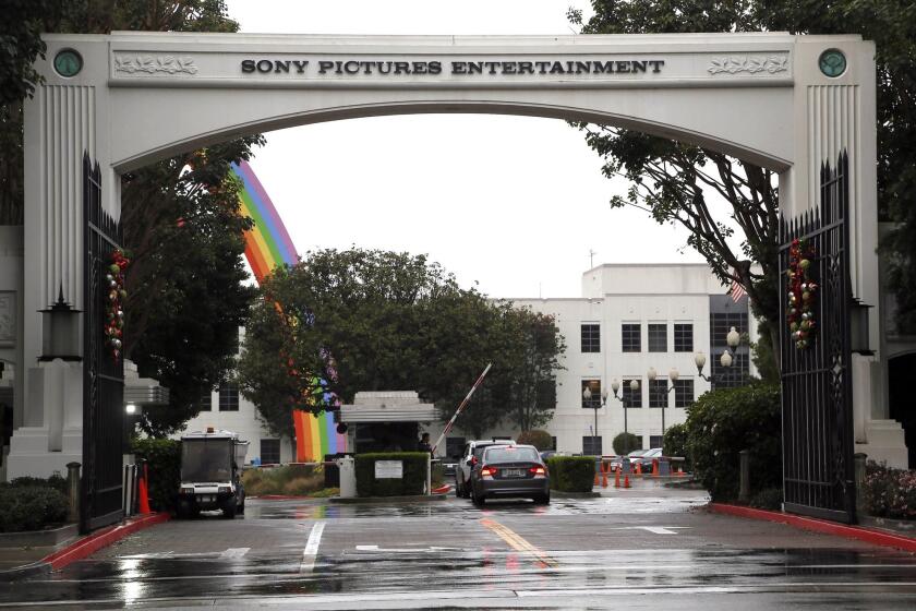 Cars enter Sony Pictures Entertainment headquarters in Culver City, Calif.