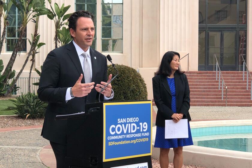 Supervisor Nathan Fletcher announces the creation Covid-19 community response fund alongside other regional leaders from the private and nonprofit sector including Nancy Sasaki, CEO of United Way of San Diego County.