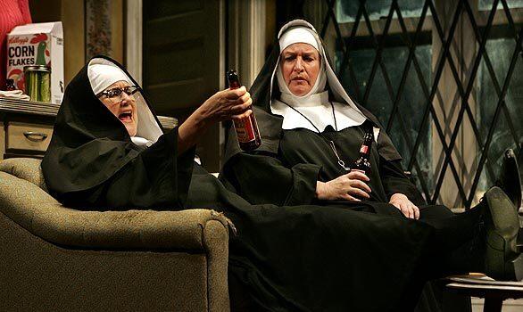 Mary Kay Wulf, left, is the second nun and Rusty Schwimmer the head nun in "The House of Blue Leaves" at the Mark Taper Forum in Los Angeles. McNulty: "John Guares dark comedy may not have been the most ingratiating way of reopening the Taper (these characters arent exactly welcome-wagon types). But Nicholas Martins grounded production, anchored by the terrific trio of John Pankow, Kate Burton and Jane Kaczmarek, resonantly revived this tale of an aging show-biz-dreaming nobody and his inconveniently screwy family."