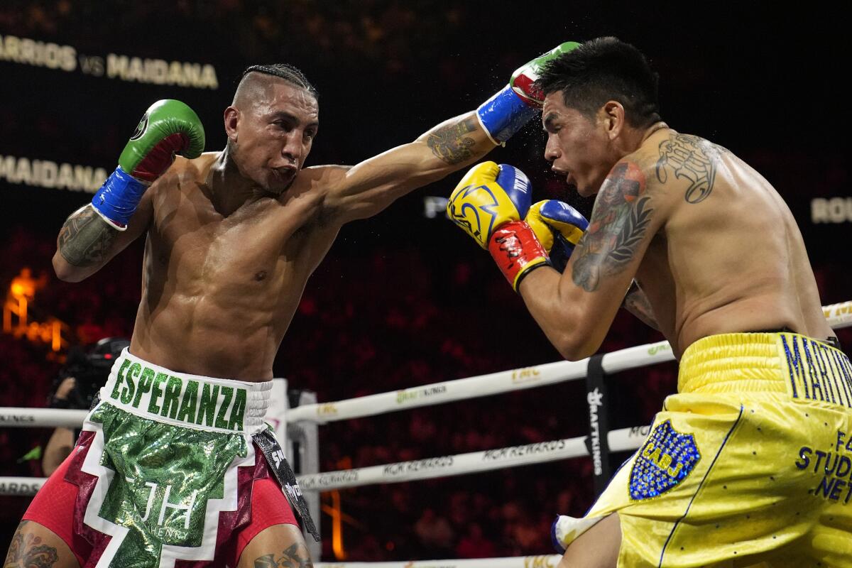 Mario Barrios lands a left to Fabian Maidana during their welterweight fight on Saturday.