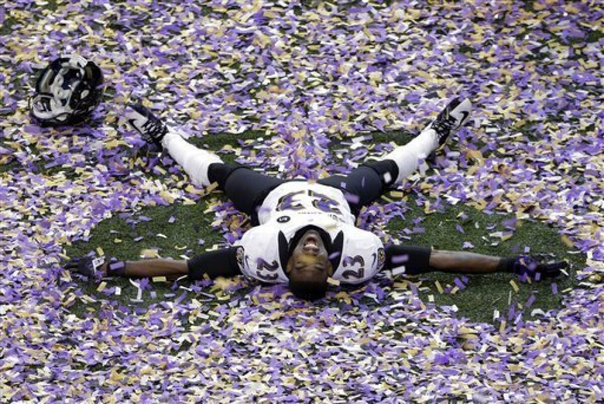 Baltimore Ravens quarterback Joe Flacco, Super Bowl MVP, holds the Lombardi  trophy at Super Bowl XLVII at the Mercedes-Benz Superdome on February 3,  2013 in New Orleans. Baltimore beats San Francisco 34-31