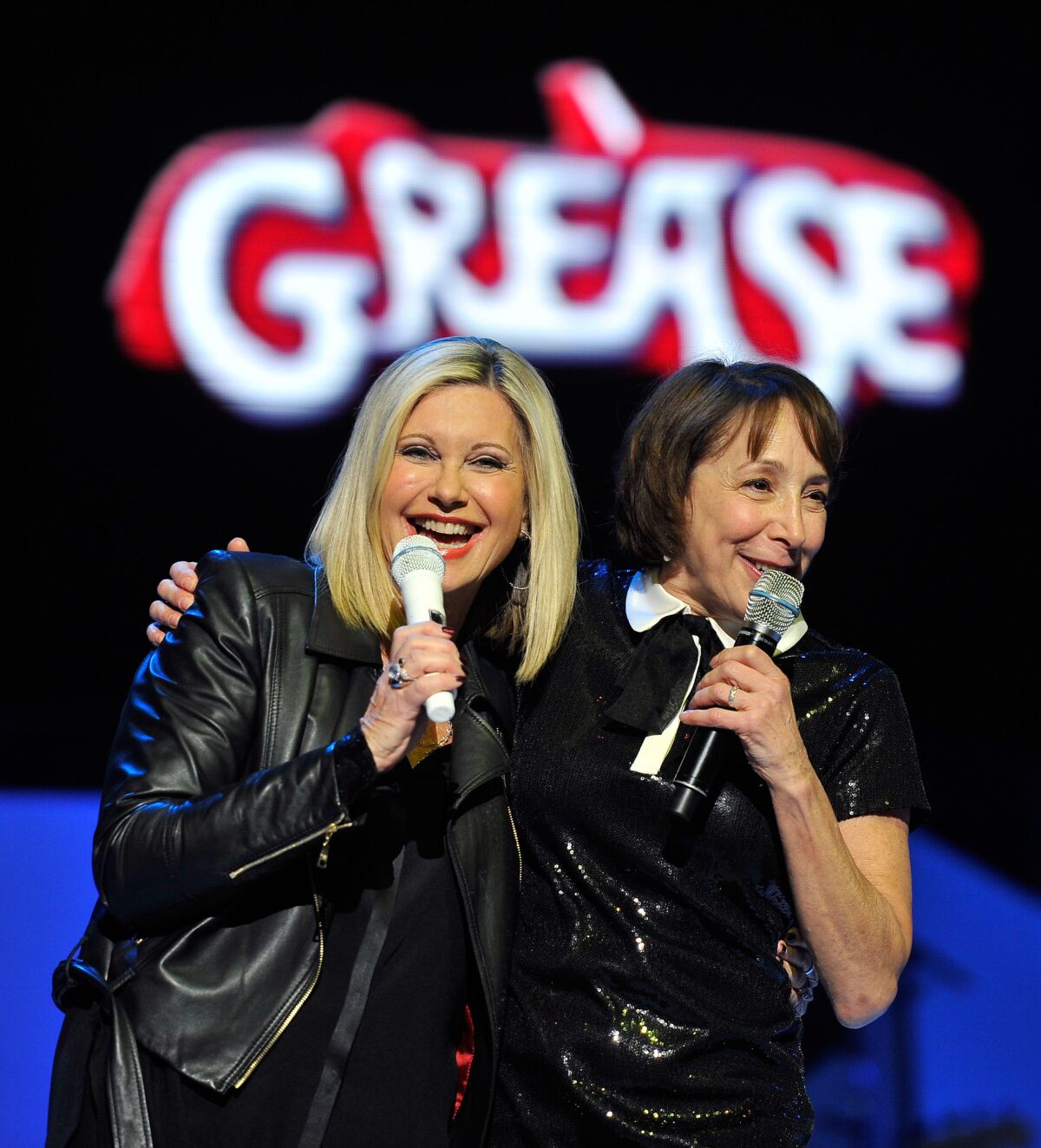 Together again: Olivia Newton-John, left, and actress Didi Conn shared the stage Jan. 3 at the Flamingo Las Vegas. The two starred in the 1978 movie "Grease."