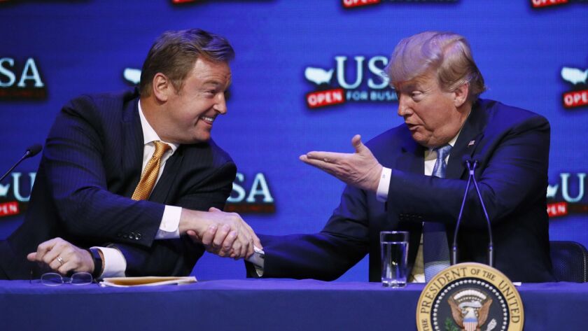 President Trump with Sen. Dean Heller (R-Nev.) during a round-table discussion on tax reform Saturday in Las Vegas.