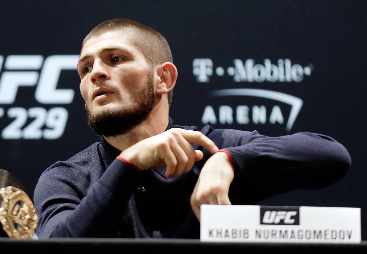 UFC lightweight champion Khabib Nurmagomedov reminds reporters that UFC 229 opponent Conor McGregor is tardy for their news conference.