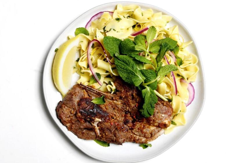 Marinated lamb shoulder chops with minty egg noodles and pickled red onions.