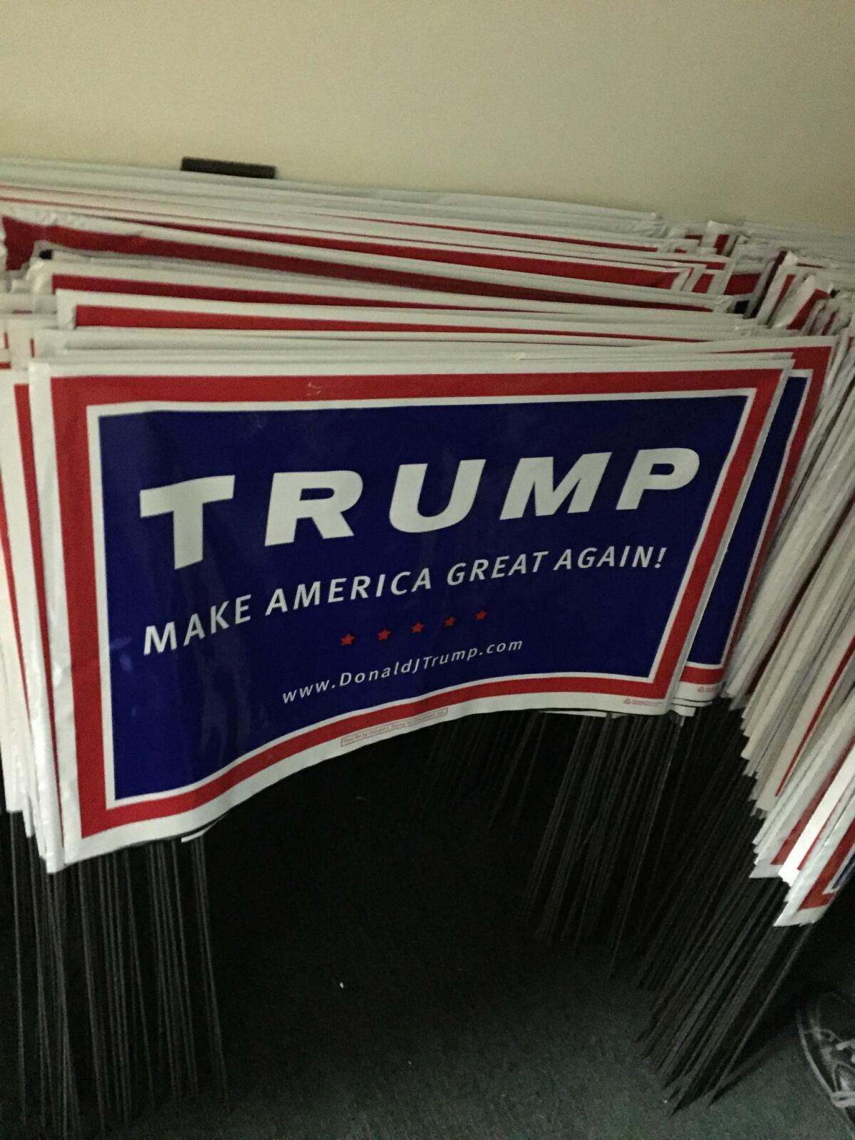 So many people have requested yard signs at Trump headquarters in Monroeville that they have been limited to one per person. (Lisa Mascaro / Los Angeles Times)
