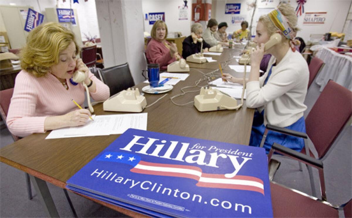 BACKERS: Volunteers for Hillary Rodham Clinton make campaign calls from a telephone bank in Philadelphia.