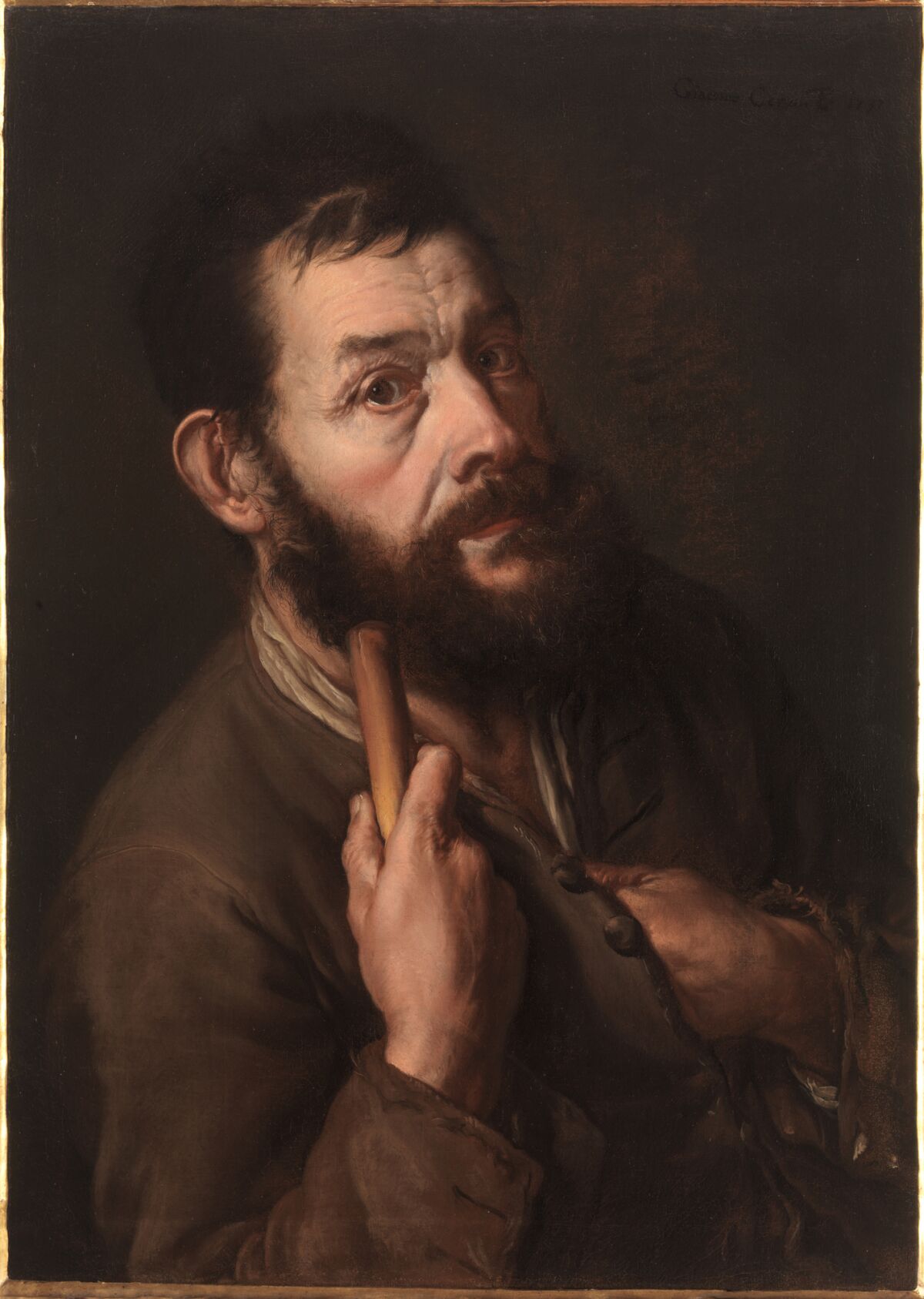In his 1737 "Self-Portrait as a Pilgrim," painter Giacomo Ceruti tucked his hand inside his jacket.