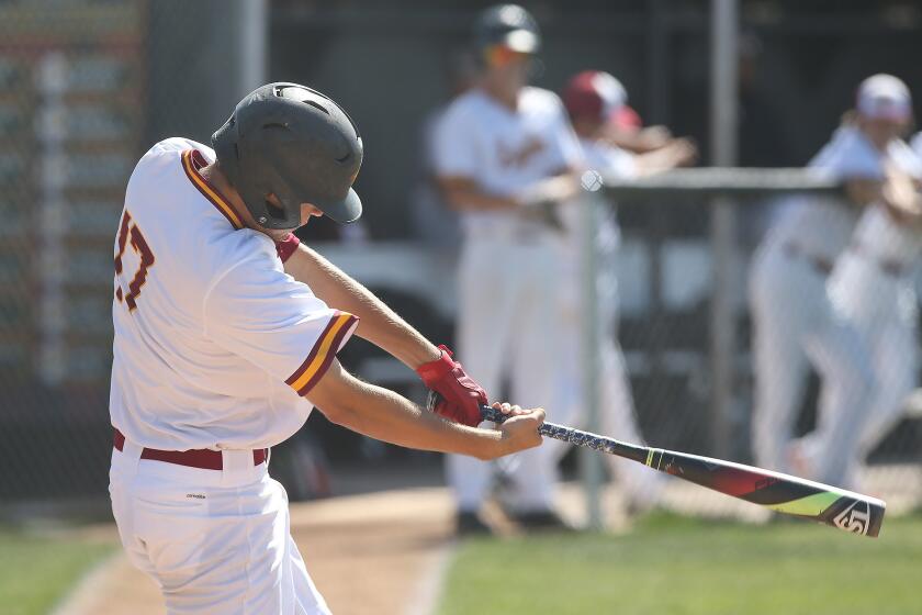 Estancia High's Justin Wood hits an inside-the-park home run in the second inning of an Orange Coast League home game against Saddleback on Wednesday.