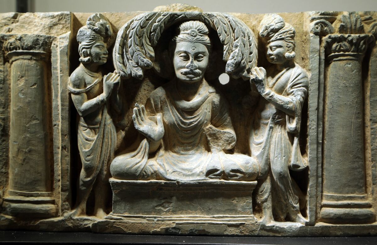 A Buddha at F. Suie One Co.