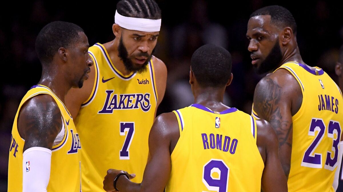 With veteran leadership from LeBron James (23) and Rajon Rondo, shown with JaVale McGee (7) and Kentavious Caldwell-Pope during an exhibition game, the Lakers have a culture of connection from players to coaches.