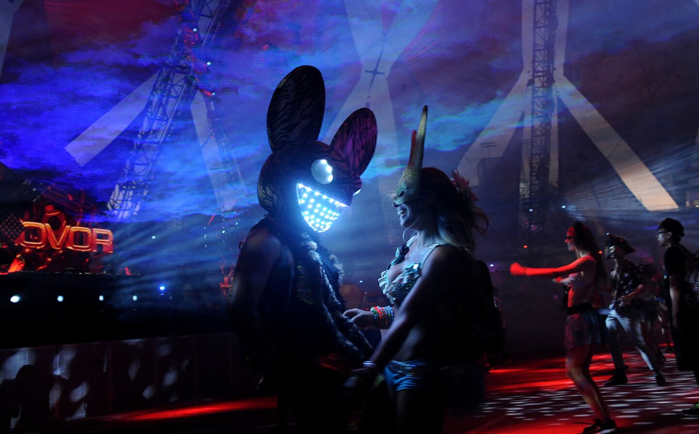 A young couple dances inside the Neon Garden during the Electric Daisy Carnival in Las Vegas on June 17.