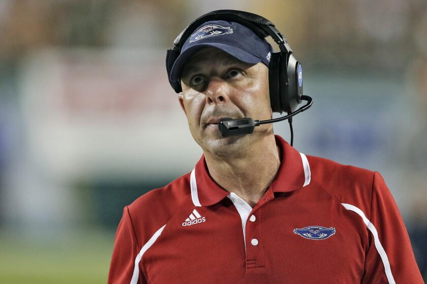 Florida Atlantic Coach Carl Pelini resigned Wednesday after less than two full seasons with the university.