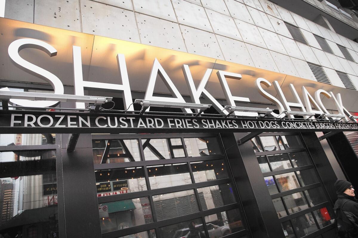 In burger-studded Los Angeles, the battle is heating up as Shake Shack, an East Coast favorite, opens its first California location in West Hollywood this year. Above, a Shake Shack in Chicago.