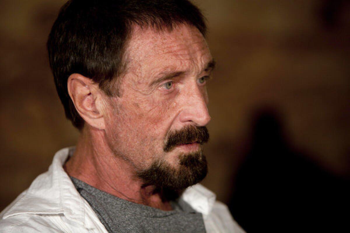 Software company founder John McAfee conducts an interview at a restaurant in Guatemala City on Dec. 4.