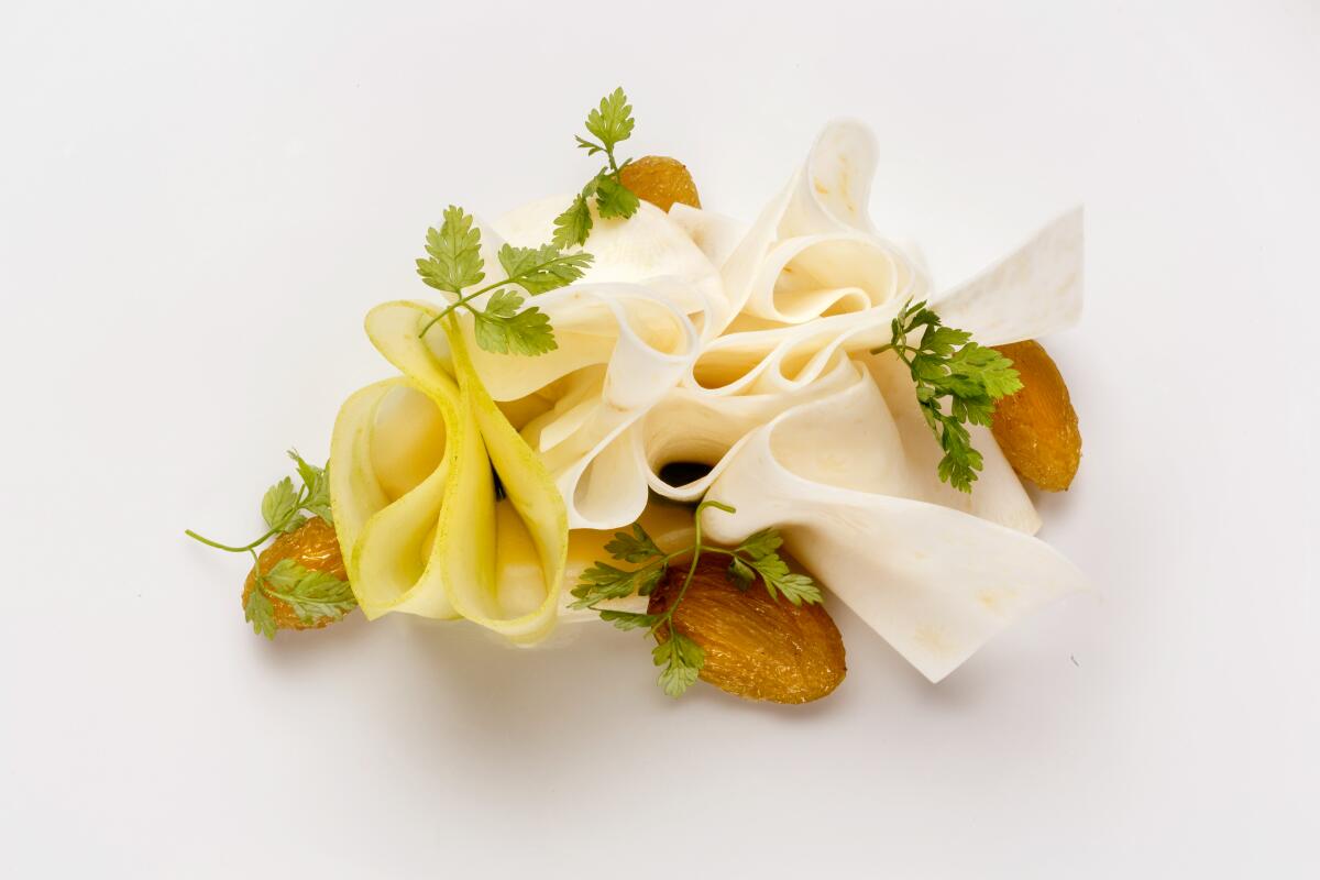 Celery root with Chartreuse raisins and chervil, served at Maude in 2015.