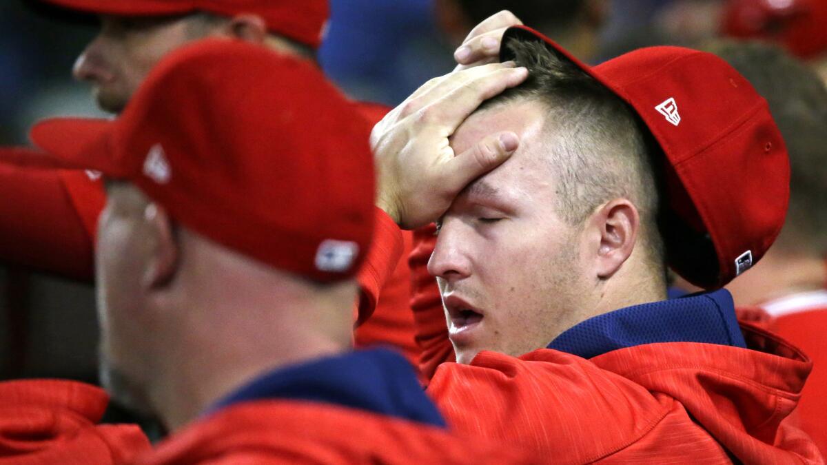 Mike Trout missed his second consecutive game Saturday because of tightness in his left hamstring.