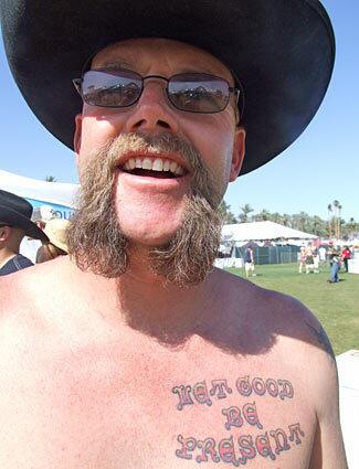 Moe Brown from Sunland, CA, shows off what he calls his moestache.