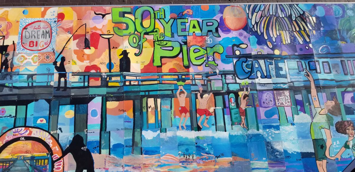 2016’s mural celebrated the 50th anniversary of the OB Pier. You’ll find it on Gianni Buonomo Vintners’ side wall, 4836 Newport Ave.