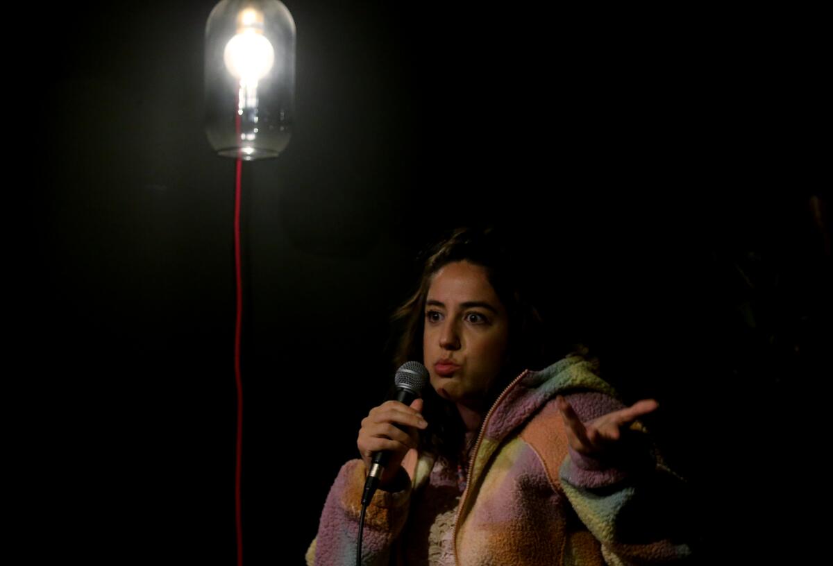 woman holding a microphone