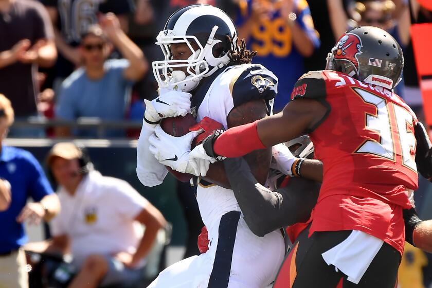 LOS ANGELES, CALIFORNIA SEPTEMBER 29, 2019-Rams running back Todd Gurley scores a touchdown against the Bucaneers in the 2nd quarter at the Coliseum Sunday. (Wally Skalij/Los Angeles Times)