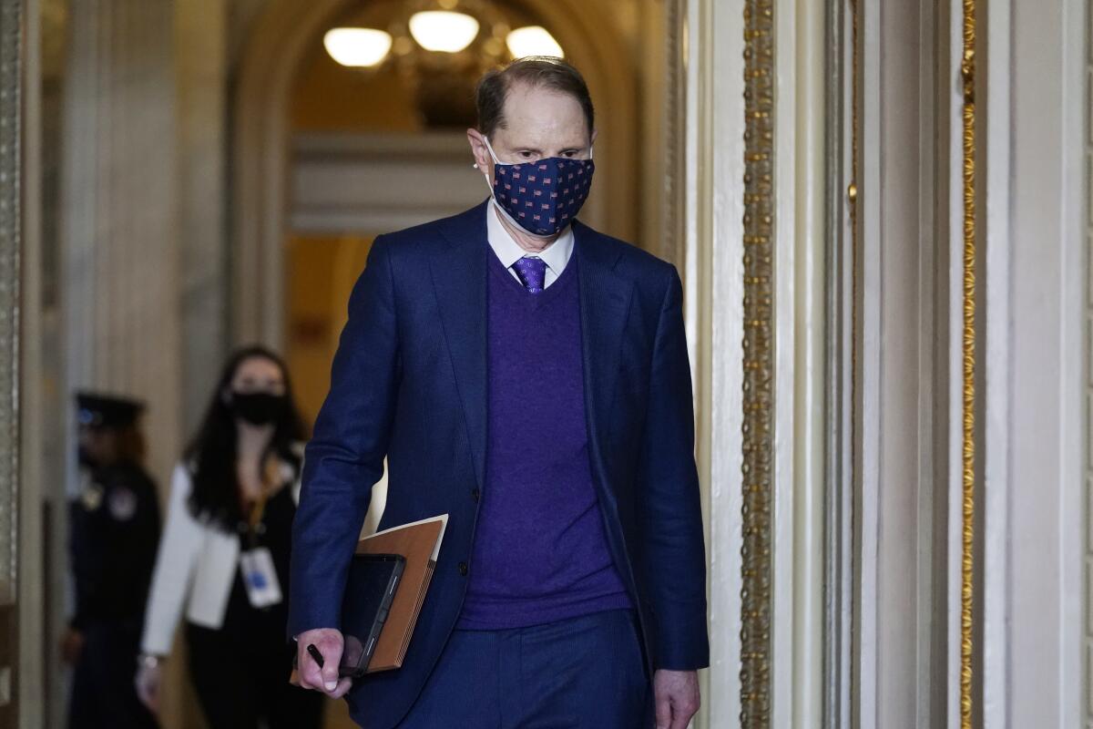 Sen. Ron Wyden arrives for the second impeachment trial of former President Trump.