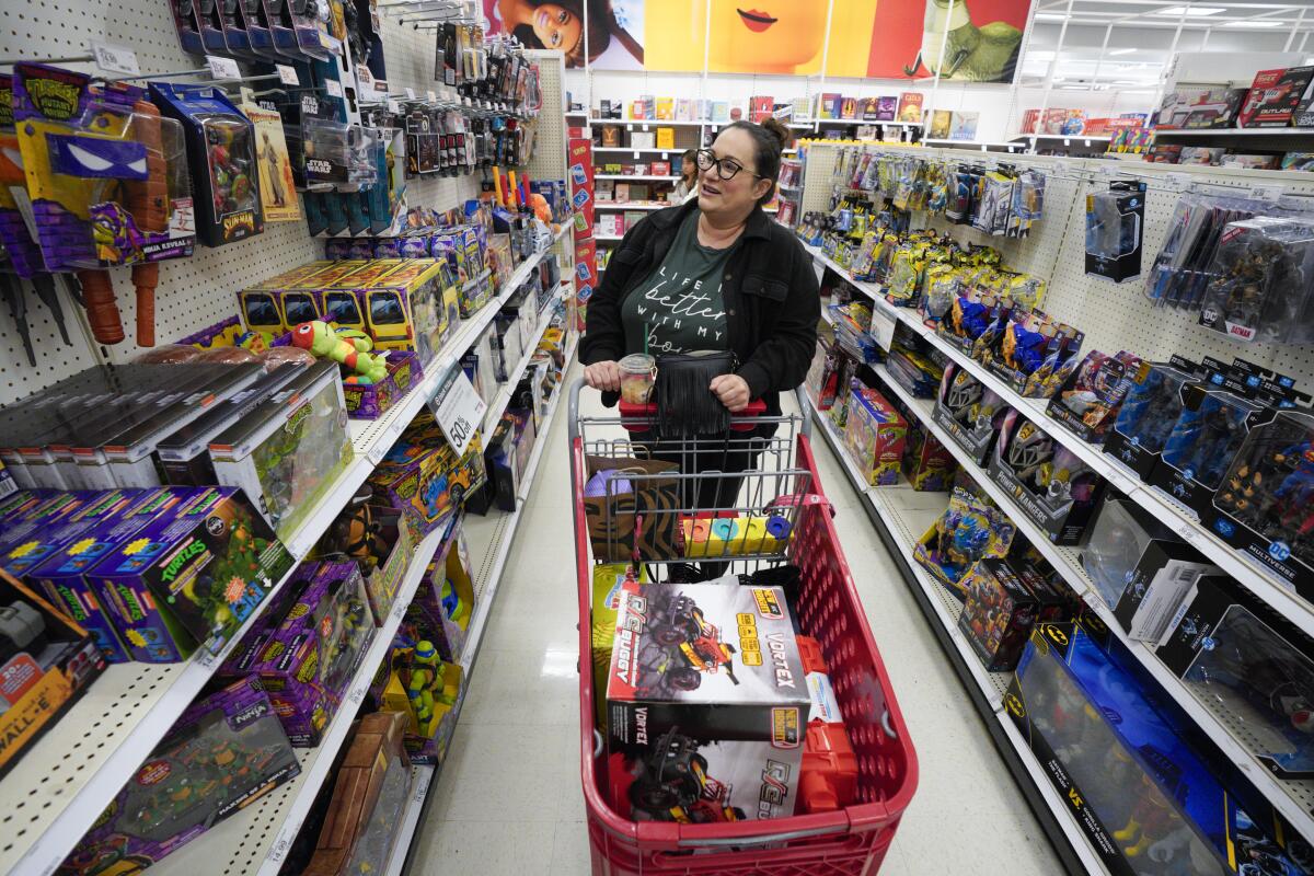 At Target in Clairemont, Shannon Gugins of Santee shopped for Christmas gifts for her three boys during Black Friday.