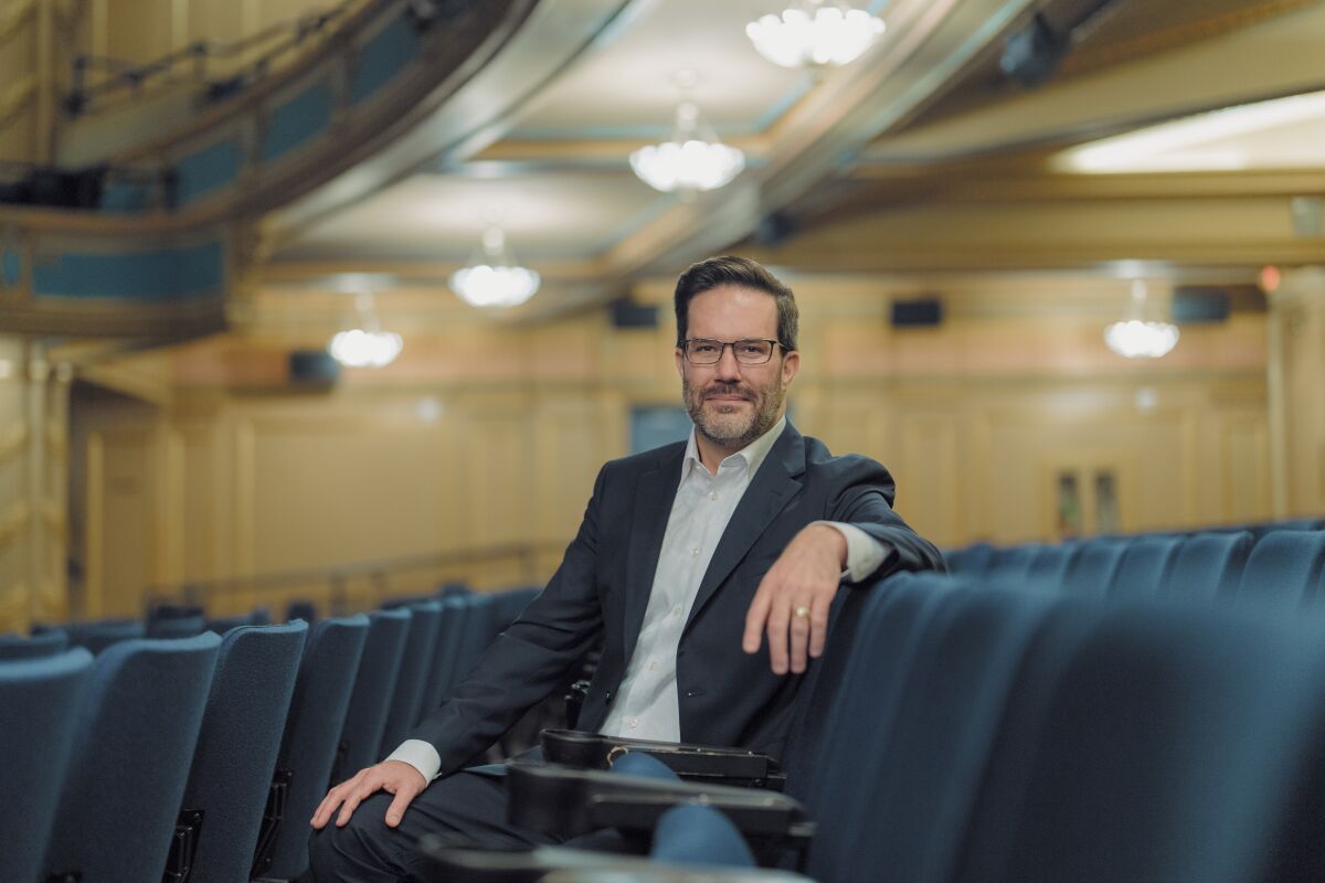 This photo provided by the Louisiana Philharmonic Orchestra shows new conductor Matthew Kraemer, who is pictured at the Orpheum in New Orleans on Nov. 8, 2022. For 17 seasons, the LPO has been under the musical direction of Carlos Miguel Prieto. That changes in the summer of 2023 when the orchestra begins to take its cues from Kraemer. The orchestra's Board of Trustees recently announced that Kramer will take over in July 2023 and have his official introduction to music lovers in mid-September. Prieto accepted a new position in North Carolina. (Justen Williams/343 Media/Louisiana Philharmonic Orchestra via AP)