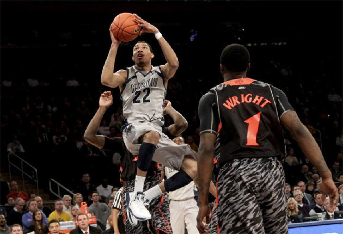 Georgetown's Otto Porter Jr. (22) goes up for a shot against Cincinnati.