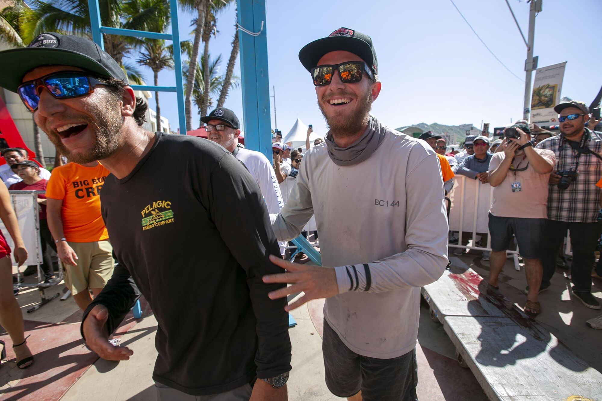 Stella June Captain Evan Salvay, left, and Seth Dubois, reacted as their 466-pound black marlin was weighed. The Bisbee Black & Blue marlin fishing tournament is the richest of it's kind in the world, with more than $4 million in prize money.