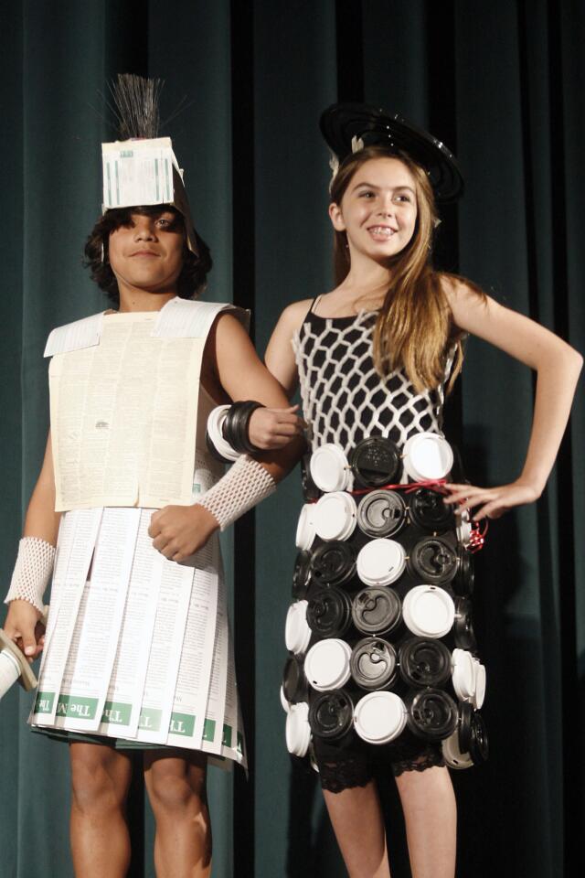Ava Pulvers, 12, left, Gianluca Vitagliano participate in the Trashin' Fashion event, which took place at John Muir Middle School in Burbank on Friday, April 6, 2012.