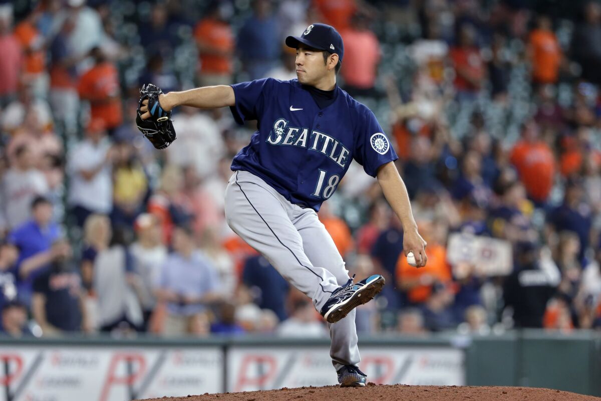 Seattle Mariners starting pitcher Yusei Kikuchi winds up for a pitch against the Houston Astros on April 29.