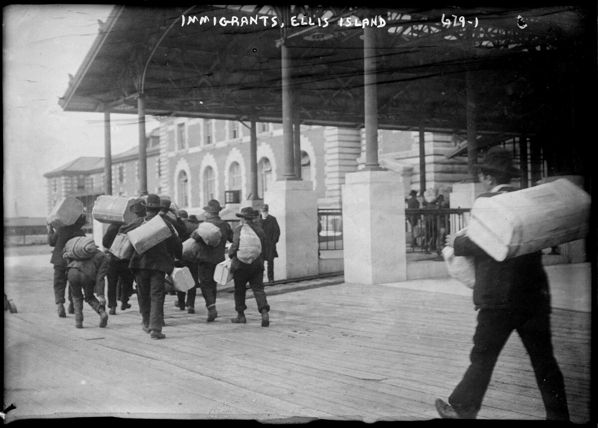 Immigrants arriving at Ellis Island. 