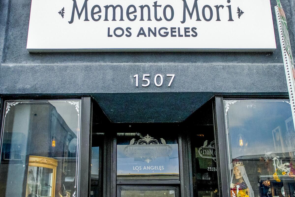 Memento Mori's store sign