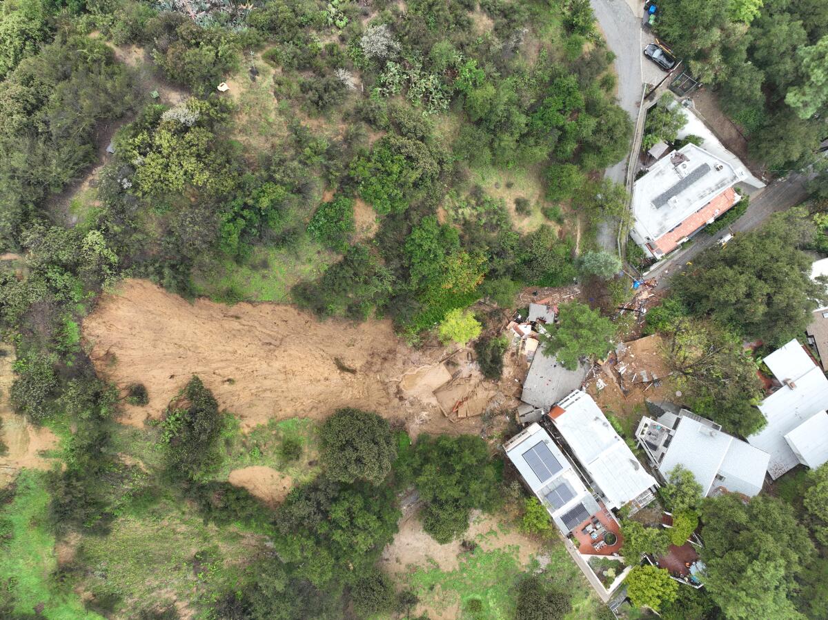 An aerial view of a Beverly Crest home that was pushed off its foundation by a mudslide on Monday.