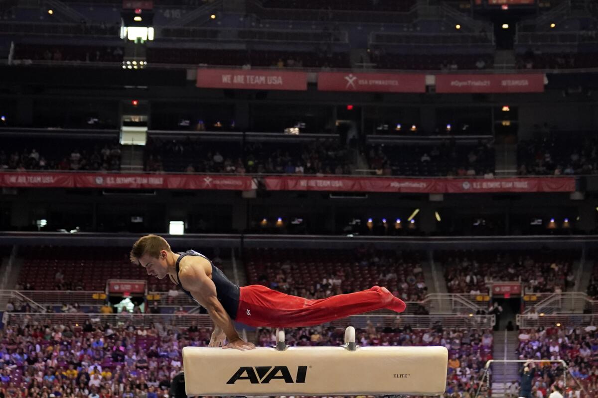 Sam Mikulak competes on the pommel horse during the men's U.S. Olympic gymnastics trials Saturday.
