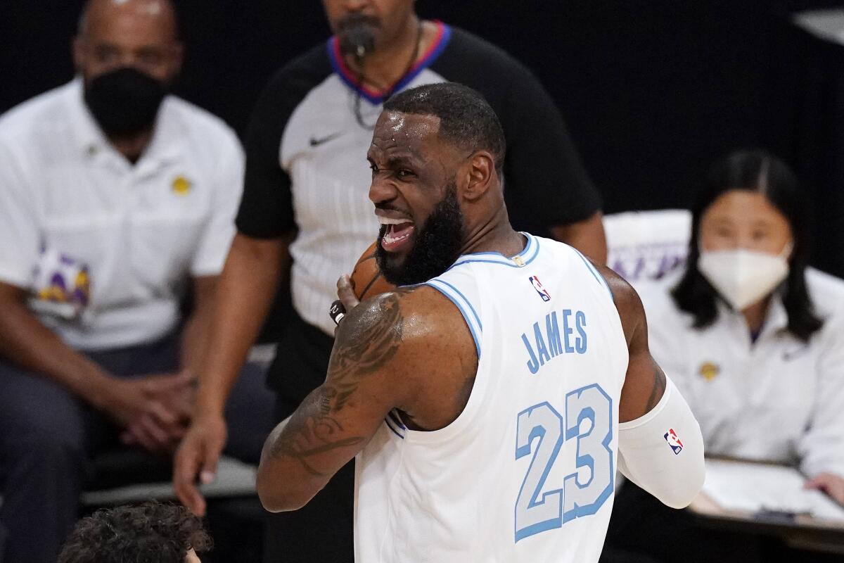 Lakers forward LeBron James gets set to pass the ball.