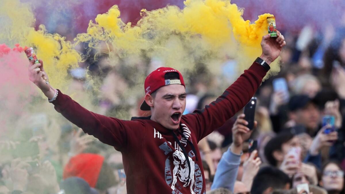 Fans attend the official opening ceremony of the FIFA Fan Fest in Moscow.