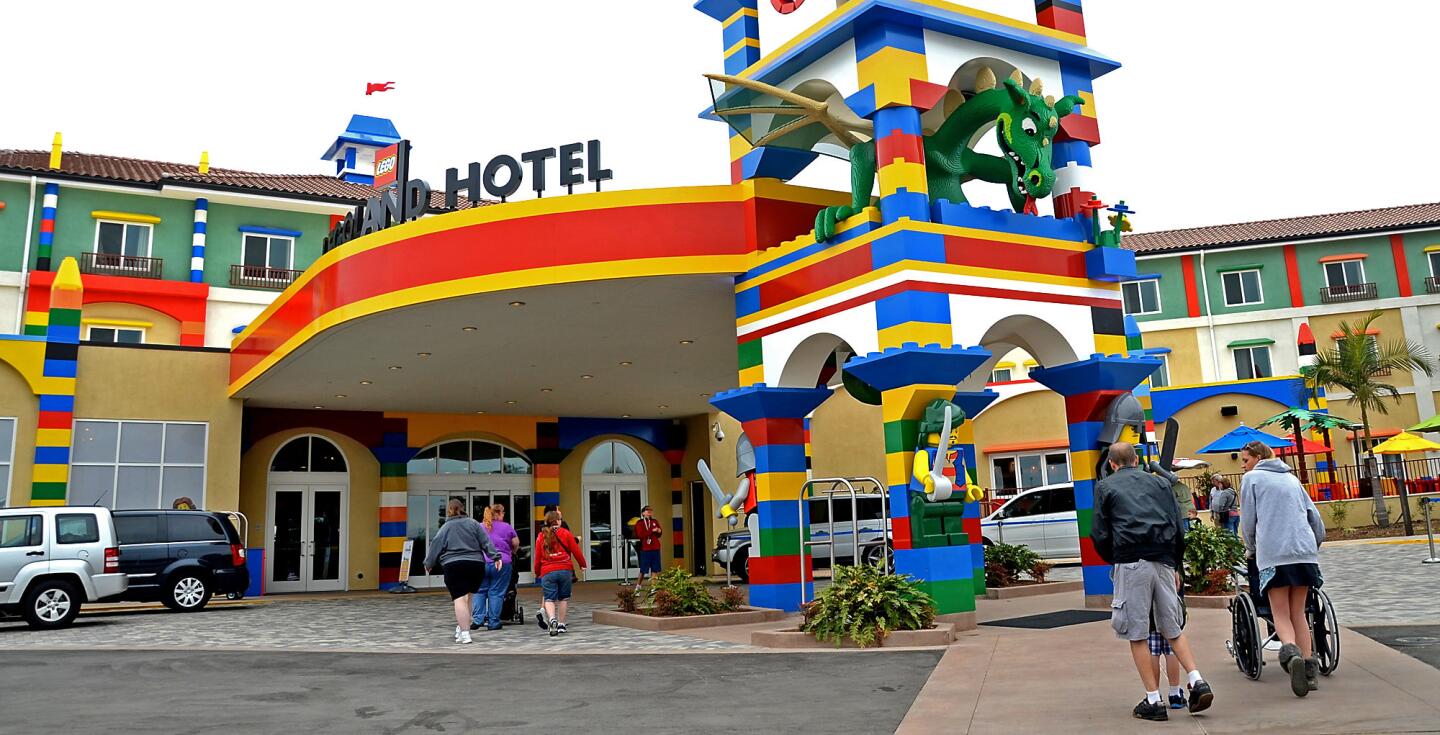 A dragon looms in the tower at the entrance to the Legoland Hotel in Carlsbad.