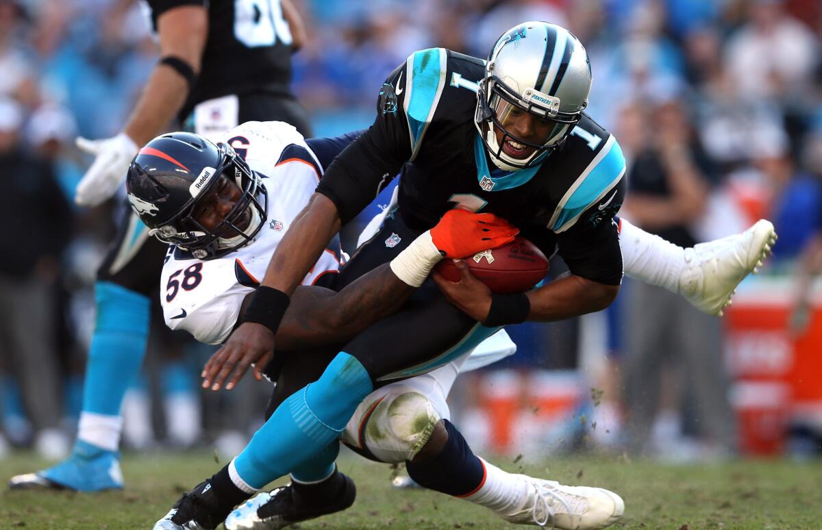 Broncos linebacker sacks Panthers quarterback Cam Newton during their game Sunday in Charlotte, N.C.