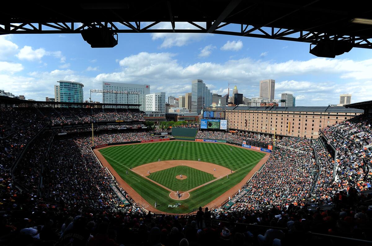 Baltimore's Camden Yards baseball stadium frames a view of part of Baltimore. United and Southwest are offering a $277 round-trip fare from LAX if you buy a ticket by June 2.