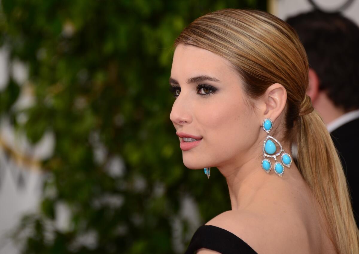 Emma Roberts wore her hair in a ponytail at this year's Golden Globe Awards.