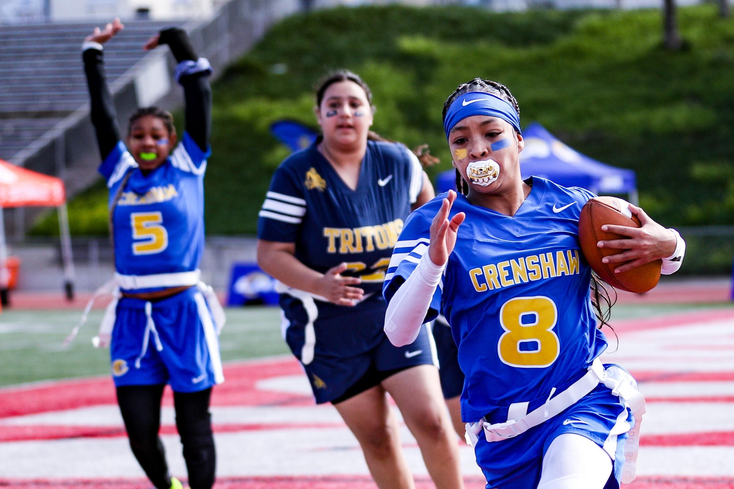Crenshaw High's De'Chelle Bracket takes off down the sideline during a League of Champions local flag football game.